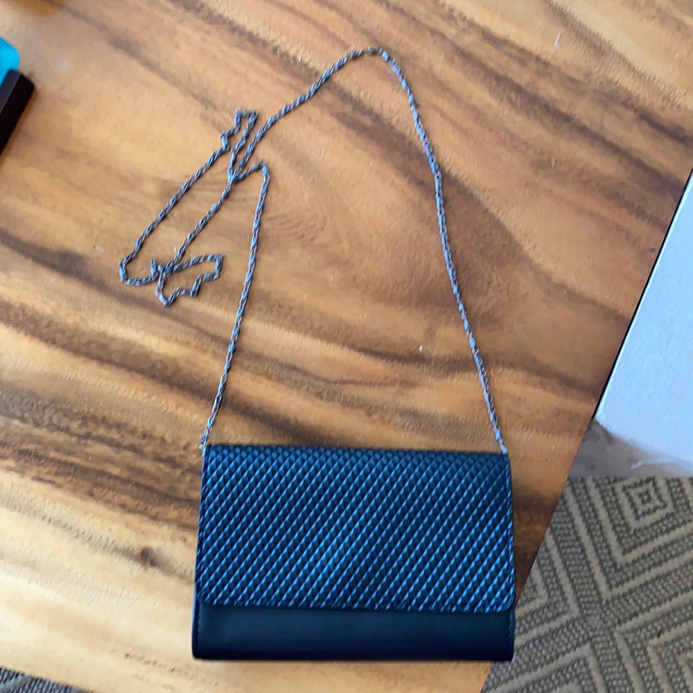Black evening bag with removable chain strap
